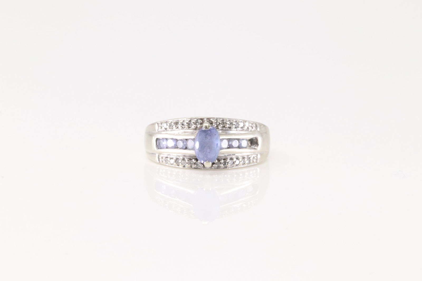 Amethyst & Diamond Ring 10Kt.: Ladies 10Kt White Gold Amethyst & Diamond Ring. This Charming Ring has Amethyst Gemstone with 24 Sparkling Diamonds. Ring size: 6.50. Total weight: 3.10 Grams.