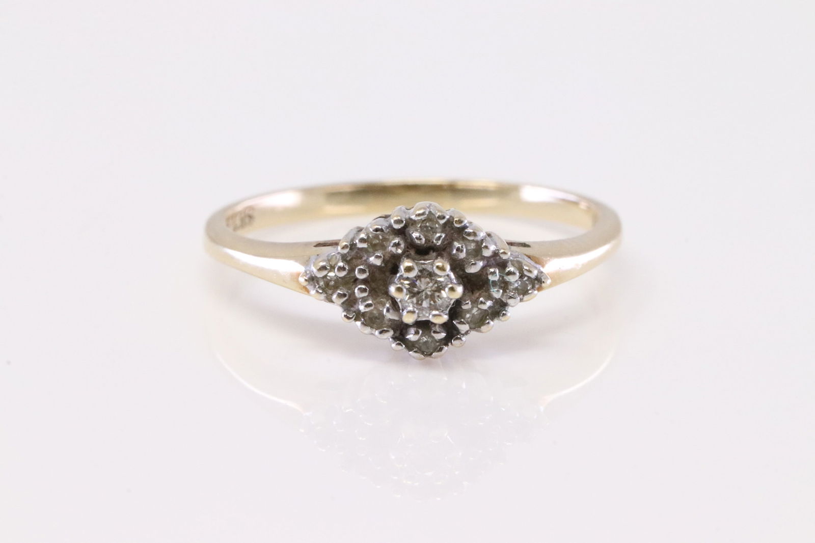 Diamond Ring 10Kt.: Ladies 10Kt Yellow Gold Diamond Ring. Ring has 9 round Diamonds. Ring size: 5.75.