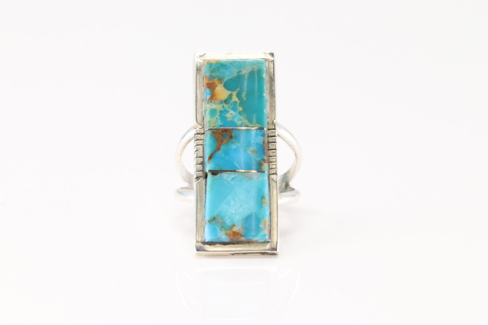Native America Navajo Sterling Silver Turquoise Inlay Ring By SF.: This is a Native America Navajo Sterling Silver Turquoise Inlay Ring By SF. Stamp SF. Ring Size: 7.00.