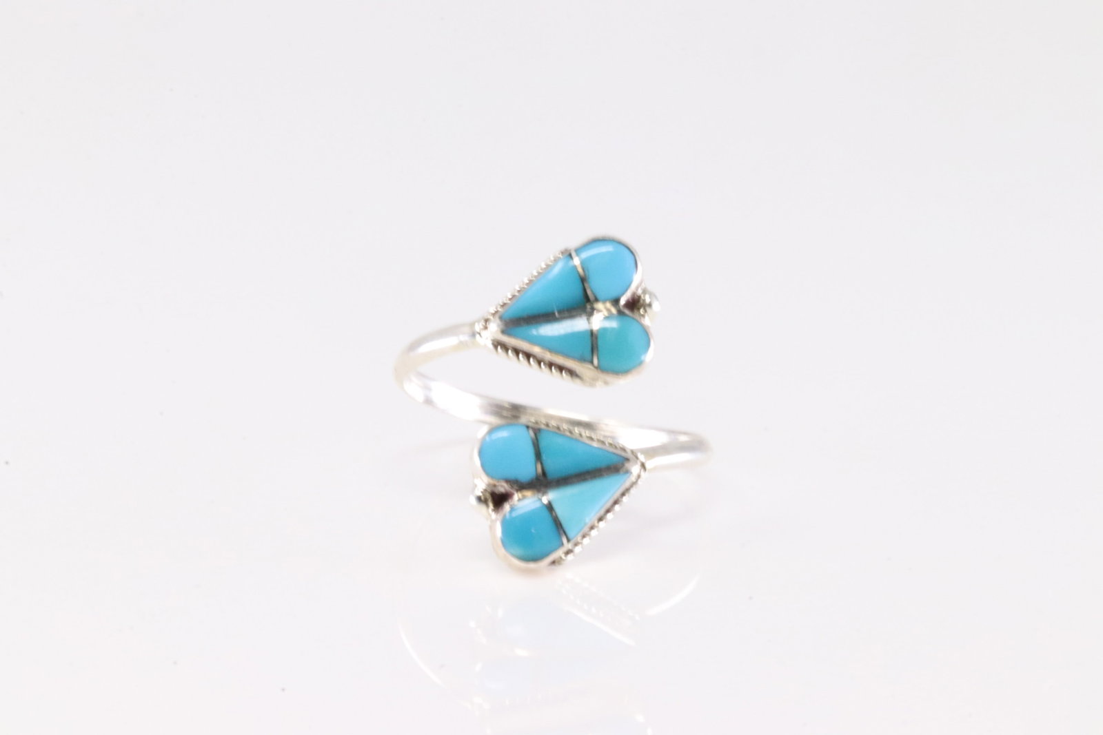 Native America Zuni Sterling Silver Turquoise Inlay Ring By R.V.N.: This is a Native America Zuni Sterling Silver Turquoise Inlay Ring By R.V.N. Ring size: 11.50.