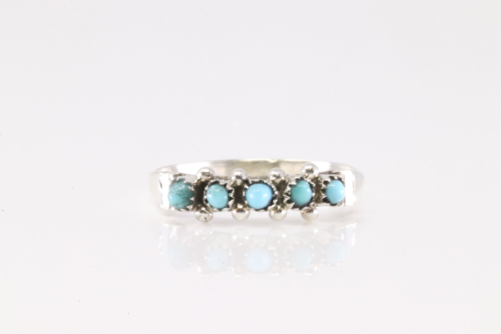 Native America Zuni Sterling Silver Turquoise Ring By Stephen Haloo.: This is a Native America Zuni Sterling Silver Turquoise Ring By Stephen Haloo. Stamp SH. Ring Size: 8.50.