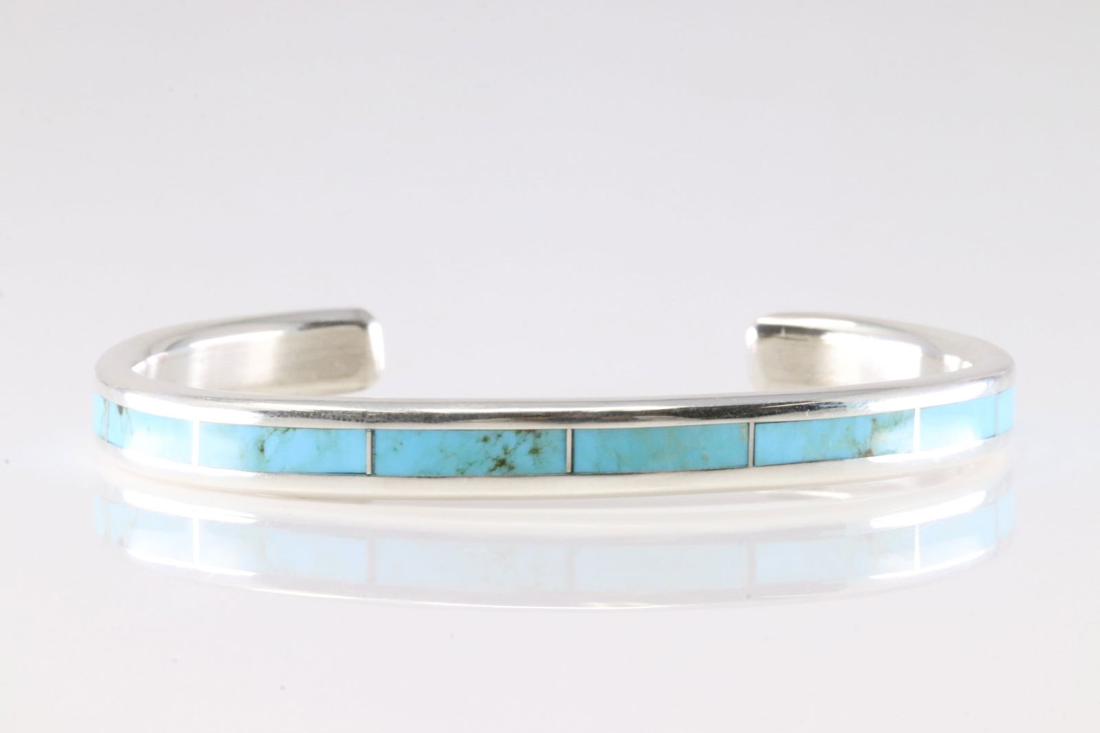 Native America Zuni Sterling Silver Turquoise Inlay Bracelet Cuff By Lawrence Lorett.: This is a Native America Zuni Sterling Silver Turquoise Inlay Bracelet Cuff By Lawrence Lorett. Stamp Loretto.