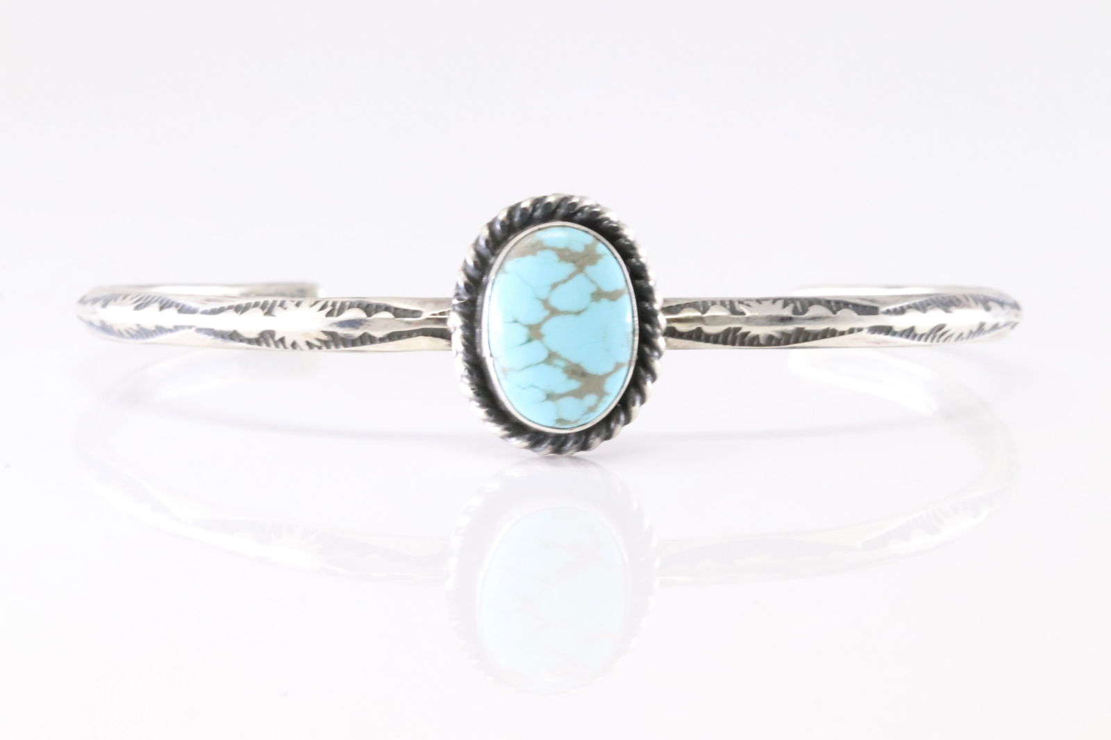 Native America Navajo Sterling Silver Turquoise Bracelet Cuff By Donovan Skeet.: This is a Native America Navajo Sterling Silver Turquoise Bracelet Cuff By Donovan Skeet. Stamp Donovan Skeet.