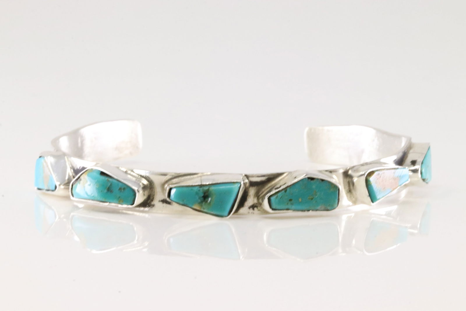 Native America Zuni Sterling Silver Turquoise Bracelet Cuff By Jude Candelaria.: This is a Native America Zuni Sterling Silver Turquoise Bracelet Cuff By Jude Candelaria.