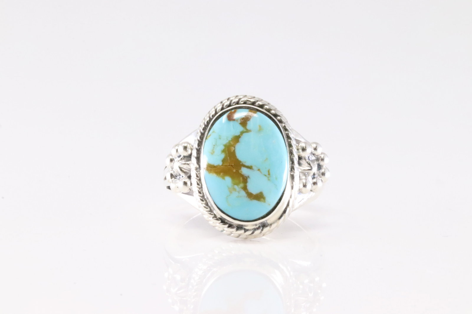 America Sterling Silver Turquoise Ring.: This is a America Sterling Silver Turquoise Ring. Ring size: 7.75.