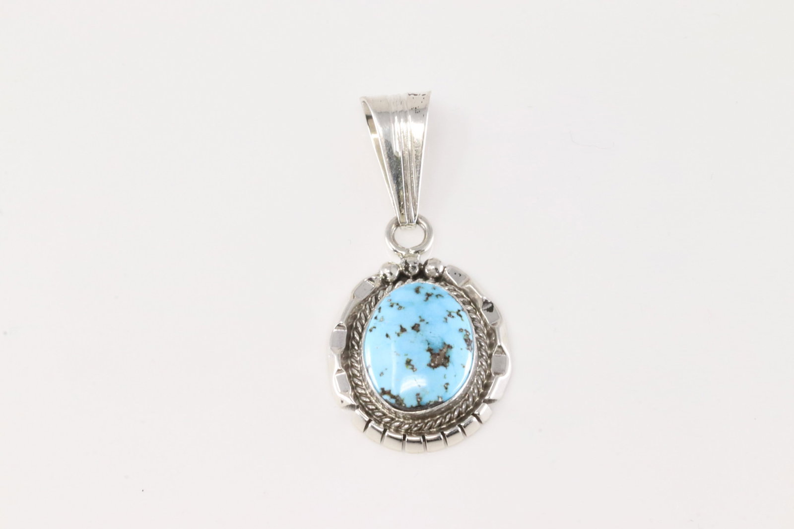 Native America Navajo Sterling Silver Turquoise Pendent By Samuel Yellowhair.: This is a Native America Navajo Sterling Silver Turquoise Pendent By Samuel Yellowhair. Satmp S.Y.