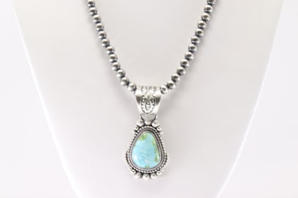 Native America Navajo Sterling Silver Turquoise Pendant By Tom Lewis. With Machine Made Stearling