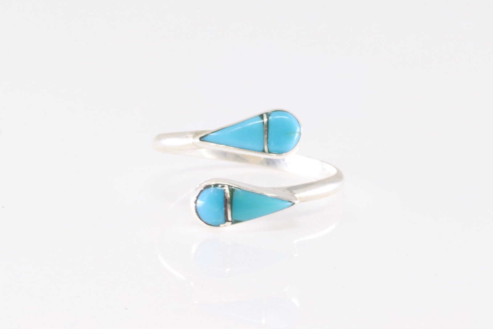 Native America Zuni Sterling Silver Turquoise Inlay Ring By RVN.: This is a Native America Zuni Sterling Silver Turquoise Inlay Ring By RVN. Ring size: 8.25.