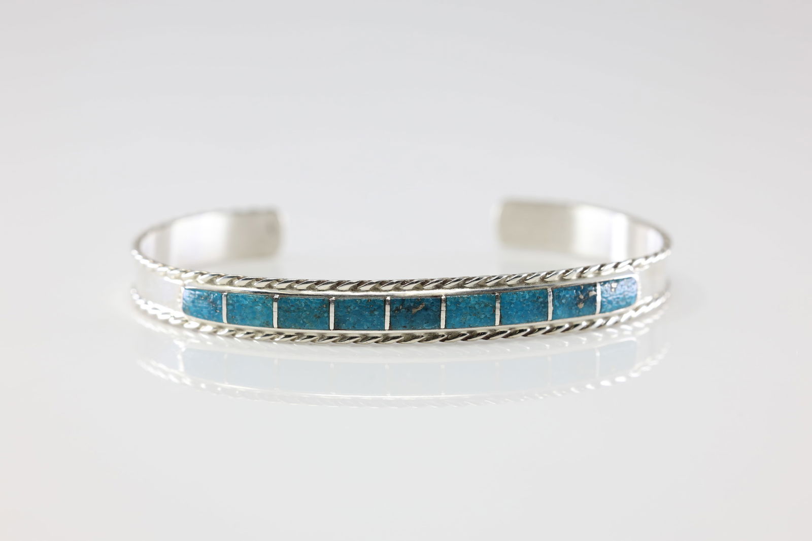 Native America Navajo Sterling Silver Turquoise Inlay Bracelet By J.P.: This is a Native America Navajo Sterling Silver Turquoise Inlay Bracelet By J.P.