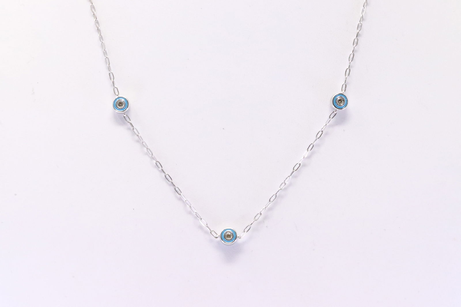Enamel & Diamond Necklace 10Kt.: 10Kt White Gold Enamel & Diamond Necklace. Necklace has Blue Enamel with round Diamonds. Diamonds weight: 0.35ctw. Necklace length: 16.00" Total weight: 3.80 Grams.