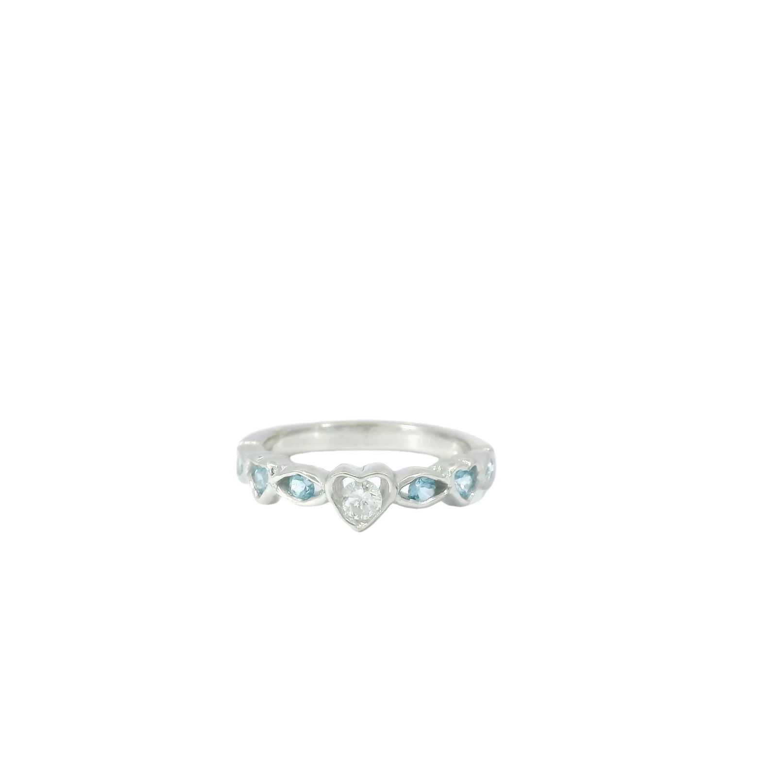 14KT White Gold Aquamarine/ Heart Diamond Ring: This exquisite ring features a heart-shaped diamond at its center, surrounded by sparkling aquamarine gemstones. The delicate band enhances its elegant charm, making it the perfect choice for any