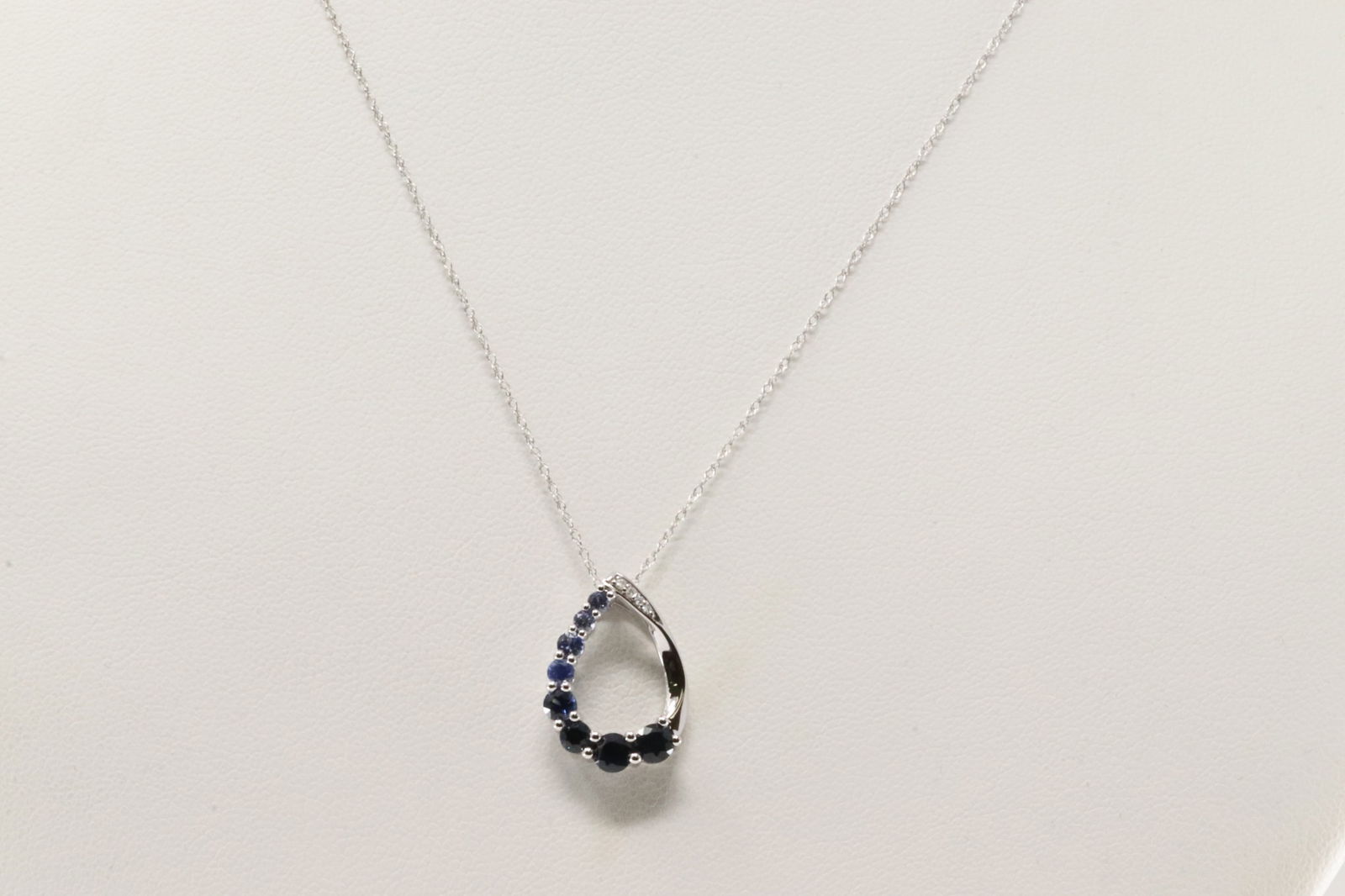 Sapphire & Diamond Pendant / Necklace 10Kt.: Ladies 10Kt White Gold Sapphire & Diamond Pendant / Necklace. This Necklace has a Pendant with Blue Sapphires and round Diamonds. Necklace length: 18.00" Total weight: 2.00 Grams.