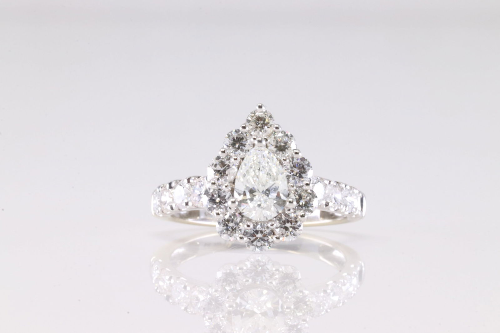 Pear Lab Grown Diamond Ring 14Kt.: Ladies 14Kt White Gold Pear Lab Grown Diamond Ring. This Elegant Ring has Pear Lab Diamond On the center with round Brilliants Diamonds. Diamonds weight approx: 2.00 ctw Ring size: 7.00. Total