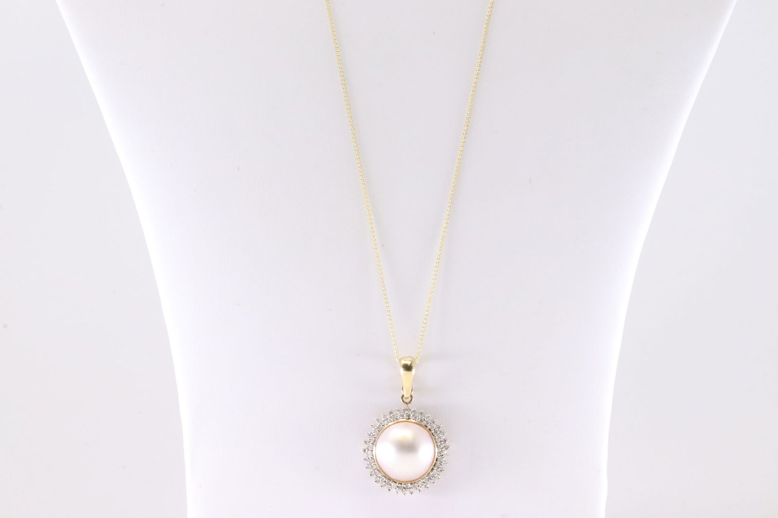 Pearl & Diamond Pendant / Necklace 14Kt.: Ladies 14Kt Yellow Gold Pearl & Diamond Pendant / Neckalce. This Elegant Pendant has Pearl Surrender By Sparkling Diamonds and A 14K Necklace. Necklace length: 22.00" Total weight: 6.41 Grams.