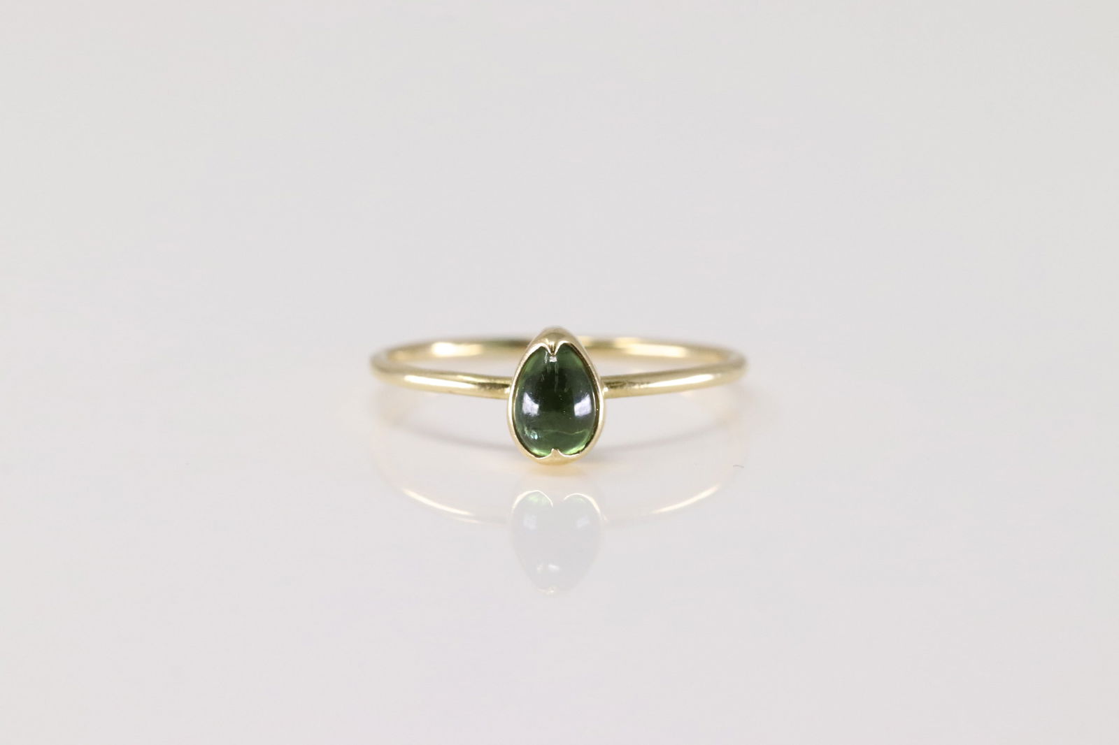 Tourmaline Ring 18Kt.: Ladies 18Kt Yellow Gold Tourmaline Ring. This Charming Ring has Solitaire Green Tourmaline Gemstone. Ring size: 6.00.