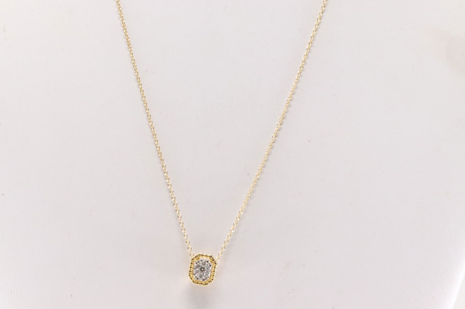 Diamond Pendant / Necklace 10Kt.: 10Kt Yellow Gold Diamond Pendant / Necklace. This Pendant has 11 Sparkling Diamonds with a Necklace. Diamonds weight: 0.15ctw. Necklace length: 18.00"