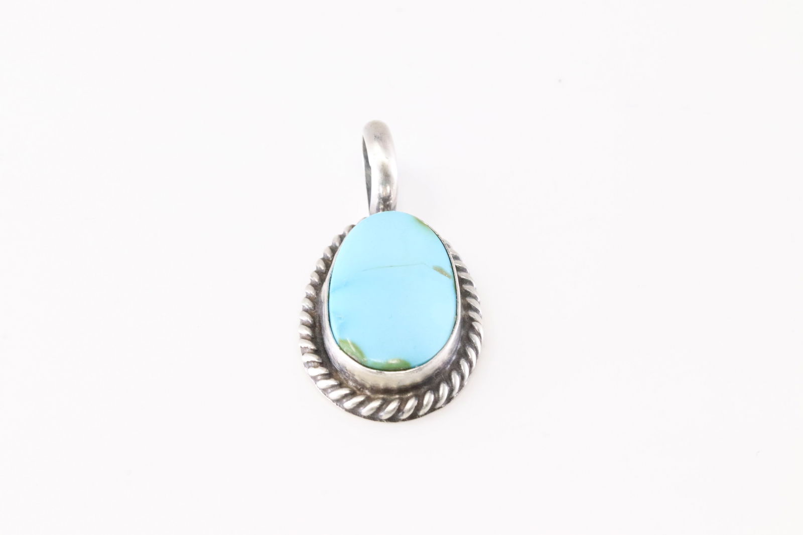 Native America Navajo Sterling Silver Turquoise Pendent By Dixon.: This is a Native America Navajo Sterling Silver Turquoise Pendent By Dixon. Stamp Dixon.