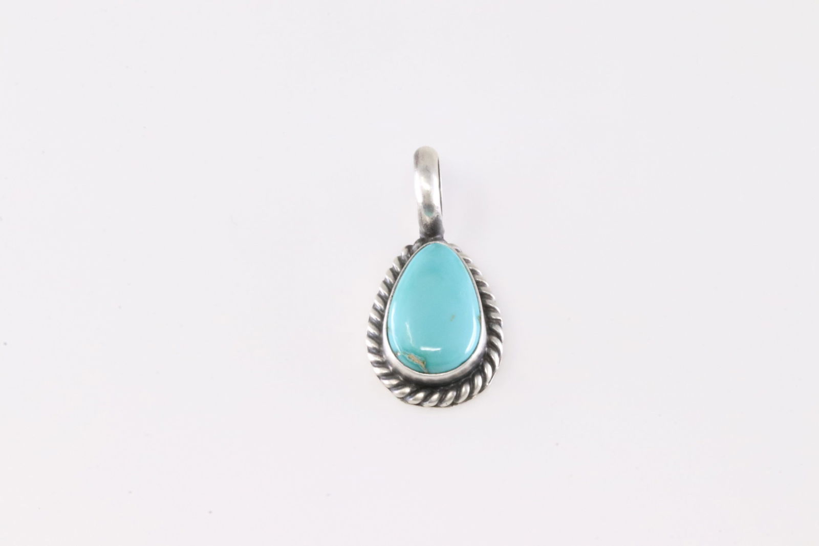 Native America Navajo Sterling Silver Turquoise Pendant By Dixon.: This is a Native America Navajo Sterling Silver Turquoise Pendant By Dixon.