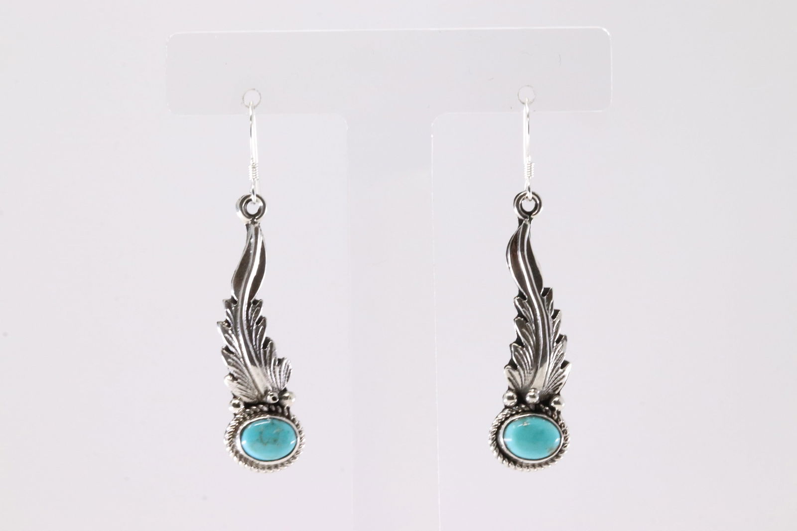 America Sterling Silver Turquoise Feather Dangling Earring's.: This is a America Sterling Silver Turquoise Feather Dangling Earring's.