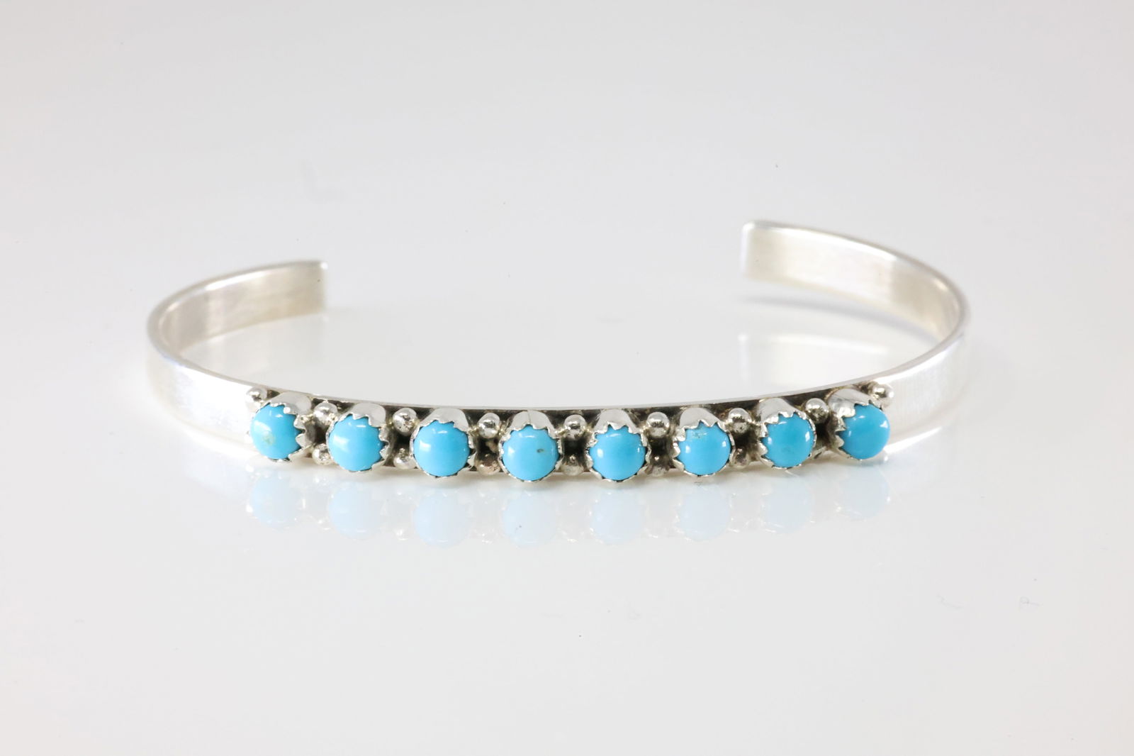Native America Navajo Sterling Silver Turquoise Bracelet Cuff By GP.: This is a Native America Navajo Sterling Silver Turquoise Bracelet Cuff By GP. Stamp GP.