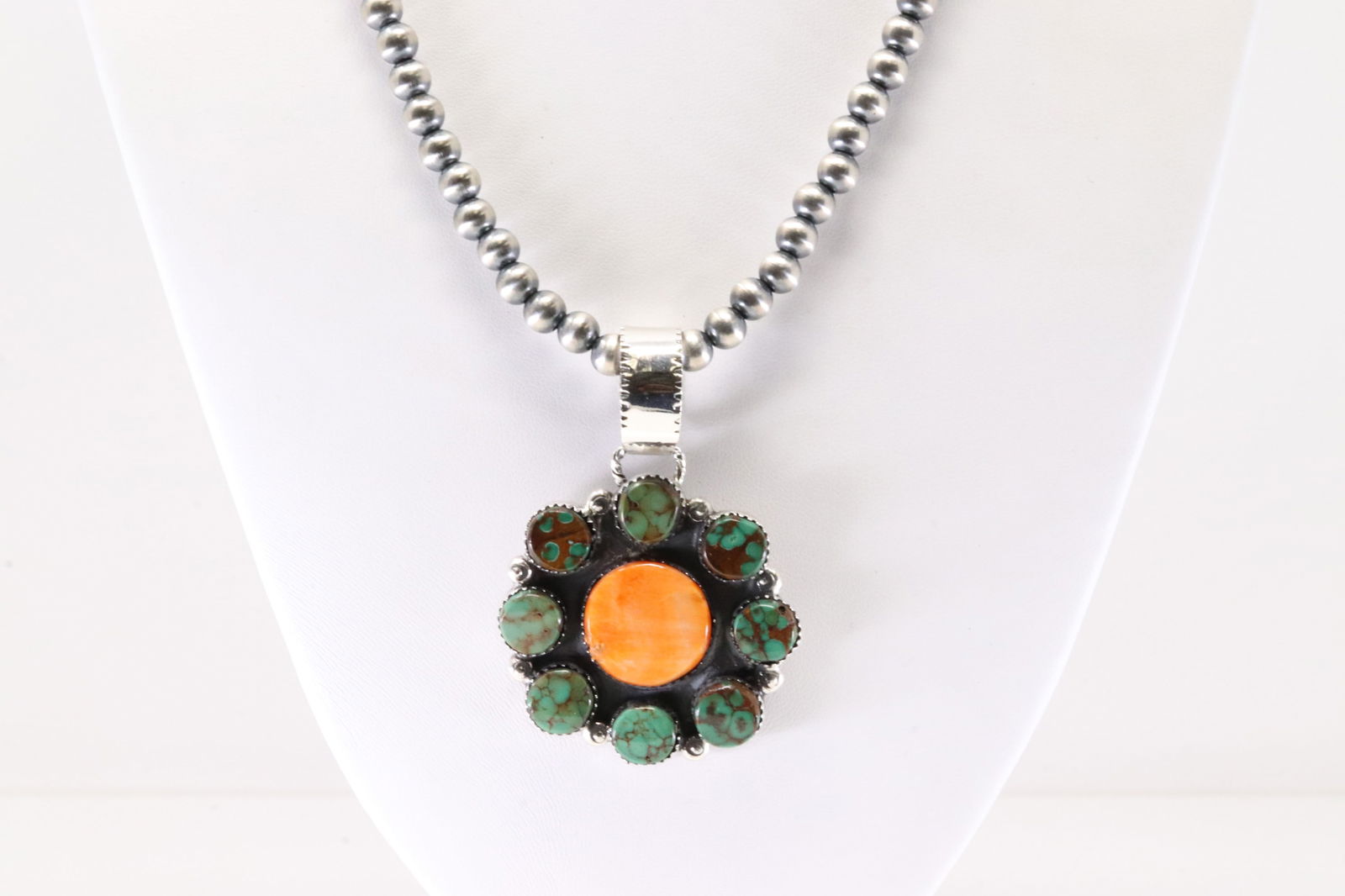 Native America Navajo Sterling Silver Spiny Oyster & Turquoise Pendant By Selena Warner. With: This is a Native America Navajo Sterling Silver Spiny Oyster & Turquoise Pendant By Selena Warner. With Machine Made Stearling Silver Pearl Beaded Necklace. Stamp SW. Necklace Length: 18.00.