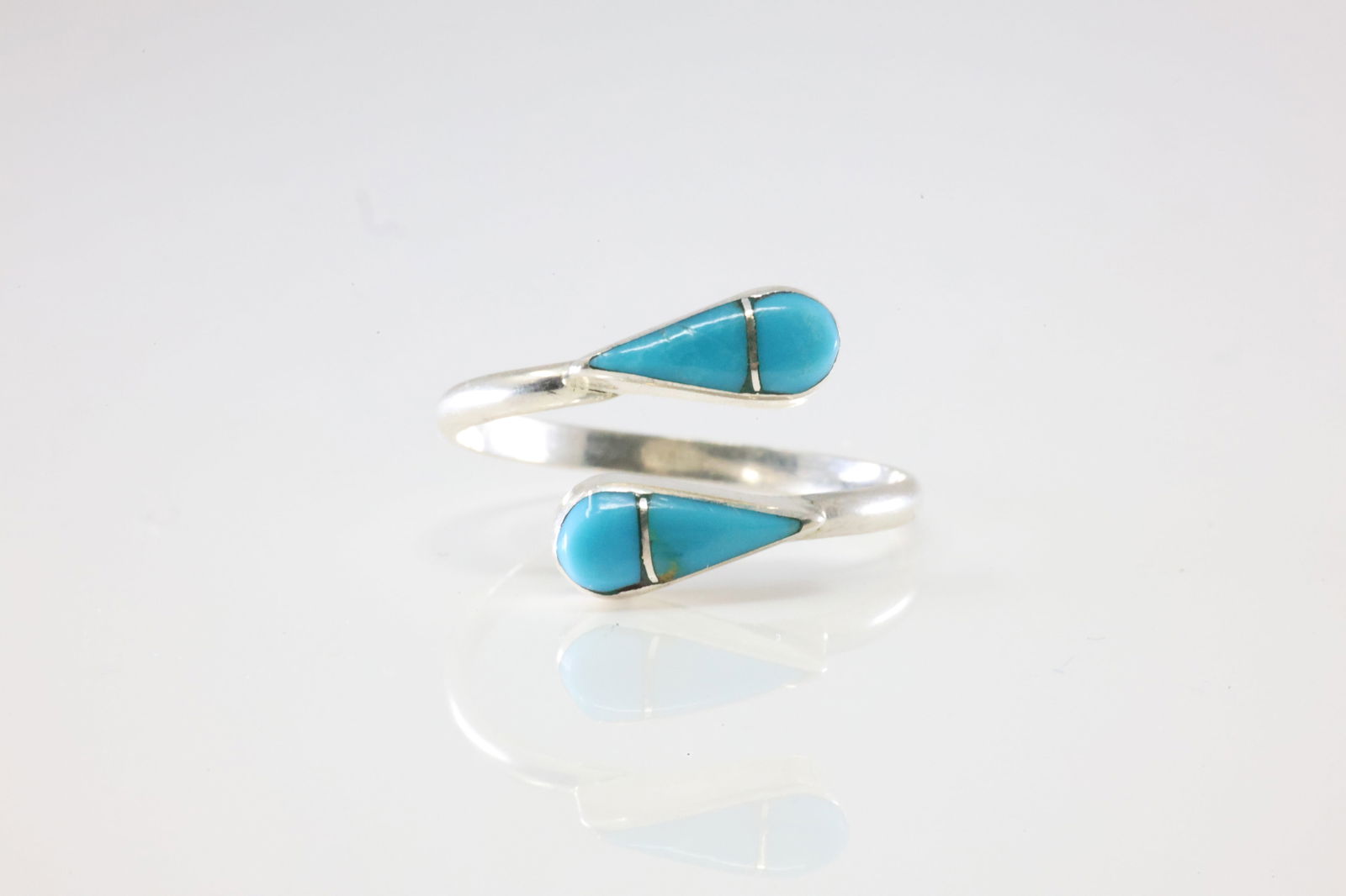Native America Zuni Sterling Silver Turquoise Inlay Ring By RVN.: This is a Native America Zuni Sterling Silver Turquoise Inlay Ring By RVN. Stamp RVN. Ring Size: 8.50.