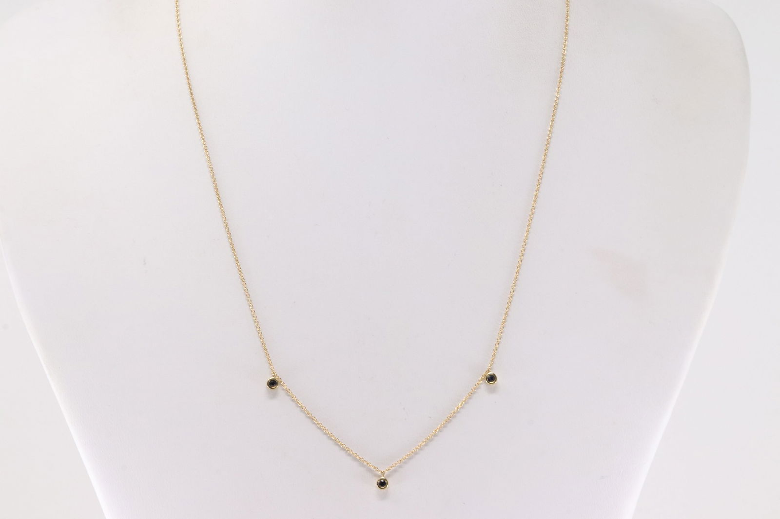Sapphire By The Yard Necklace 14Kt.: Ladies 14Kt Yellow Gold Sapphire By The Yard Necklace. This By The Yard Design Necklace has 3 Blue round Sapphires. Sapphires weight: 0.10ctw. Necklace length: 18.00"