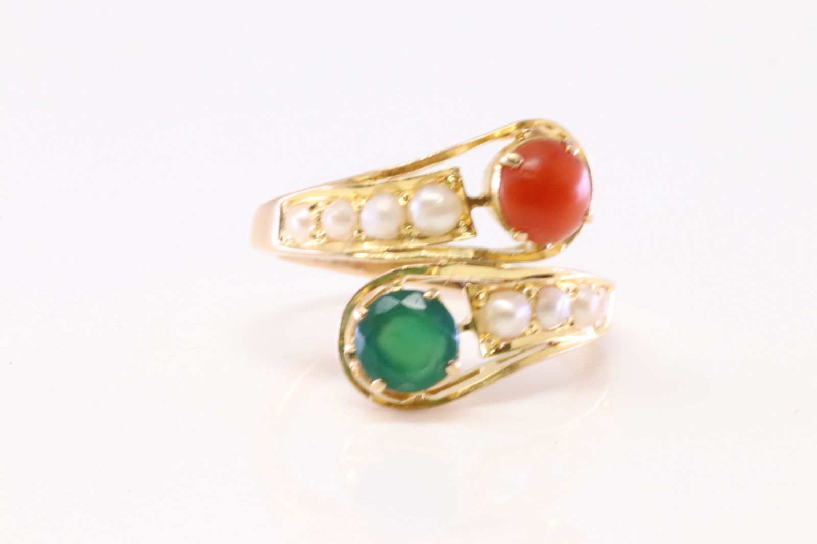 Multi-Color Stone Ring 18Kt.: Ladies 18Kt Yellow Gold Multi-Color Stone Ring. Ring has One Emerald / Coral & Pearl's. Ring size: 5.50. Total weight: 5.00 Grams.