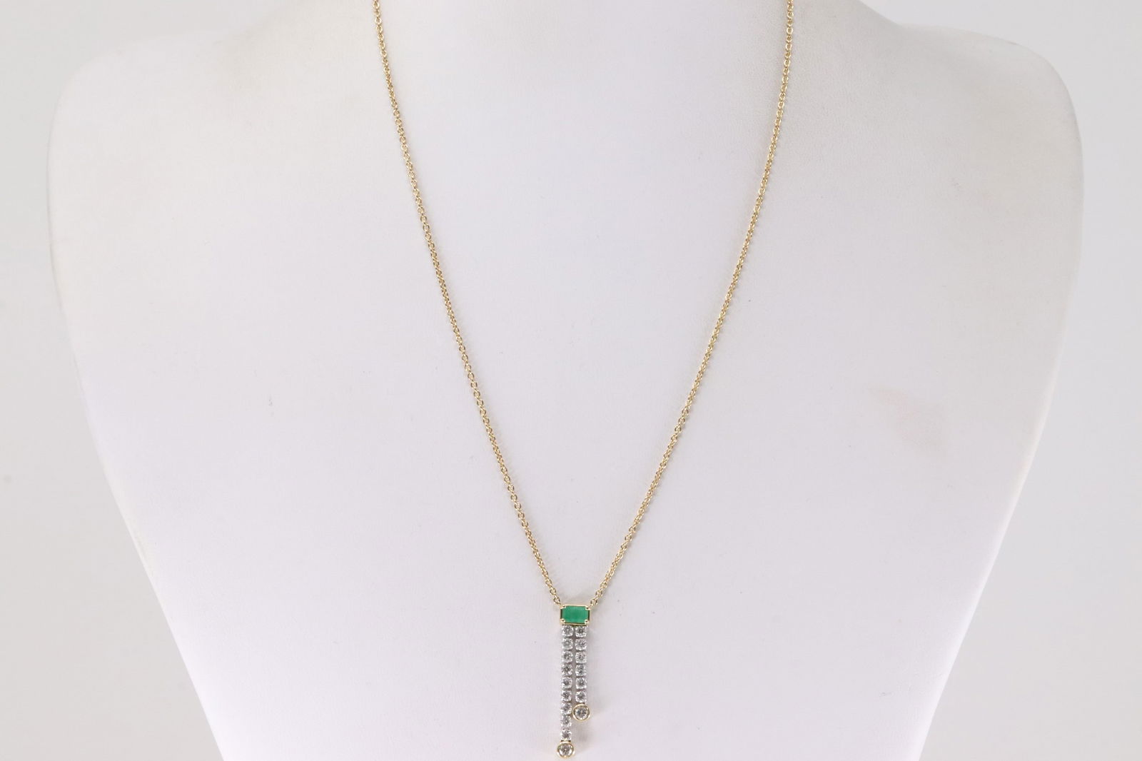 Emerald & Diamond Pendant / Necklace 14kt.: Ladies 14kt Yellow Gold Emerald & Diamond Pendant / Necklace. This Pendant has 18 Sparkling Diamond & A Rectangular Emerald. Diamond Weight: 1.06ctw. Necklace Length: 16.00". Total Weight: 3.20 Grams.