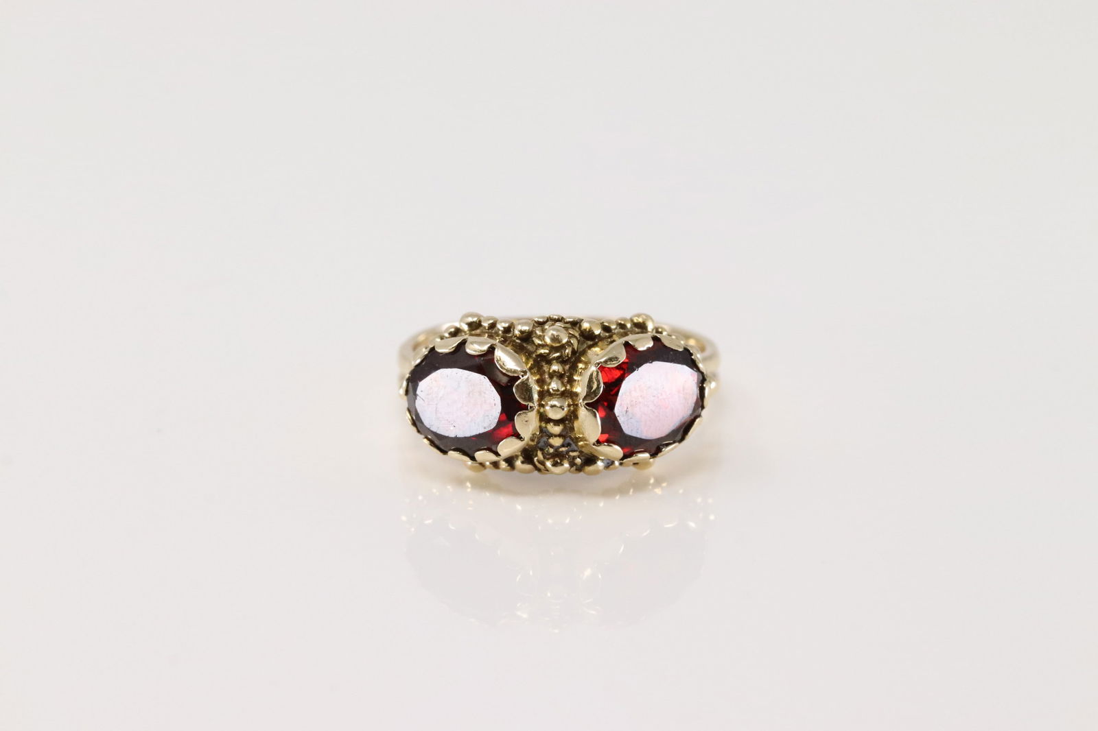 Garnet Ring 14Kt.: 14Kt Yellow Gold Garnet Ring. This Elegant Ring has 2 Oval Garnet Gemstone. Ring size: 8.25. Total weight: 5.50 Grams.