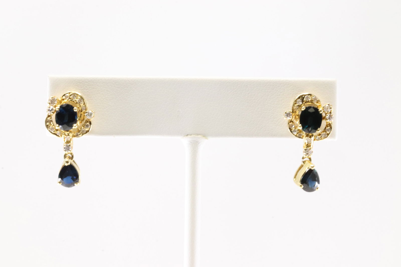 Sapphire & Diamond Stud Earring 14Kt.: Ladies 14Kt Yellow Gold Sapphire Diamond Stud Earring. This Elegant Earring's has 4 Gorgeous Blue Sapphire Gemstones With 30 Round Sparkling Diamonds. Diamond Approx Weight: 0.35 ctw Total Weight: 6.0