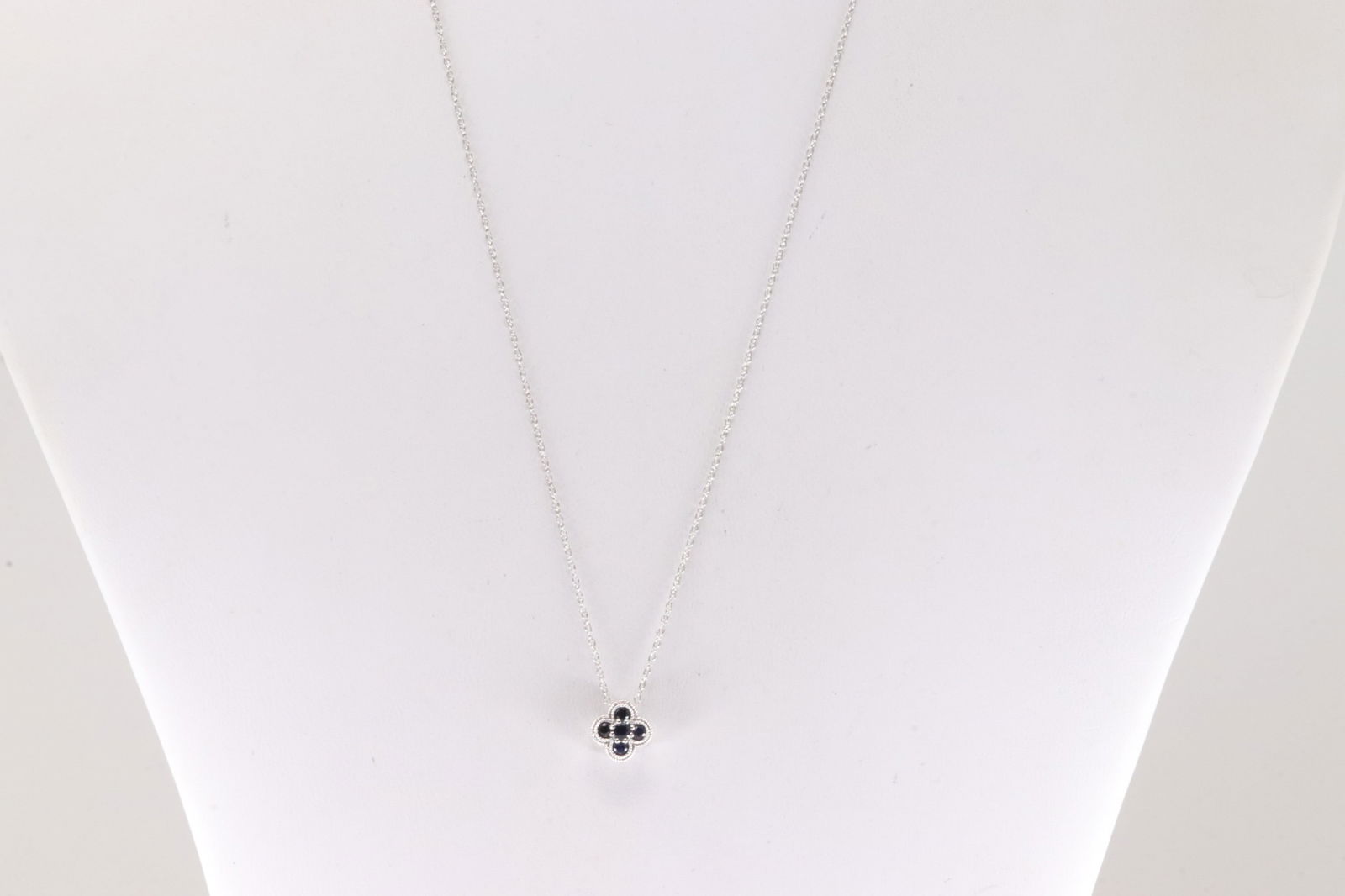 Sapphire Flower Pendant / Necklace 14Kt.: 14Kt White Gold Sapphire Flower Pendant / Necklace. This Beautiful Flower Design Pendant has 5 Blue Sapphire's and A 14k Necklace. Sapphire weight approx: 0.27ctw. Necklace length: 18.00"