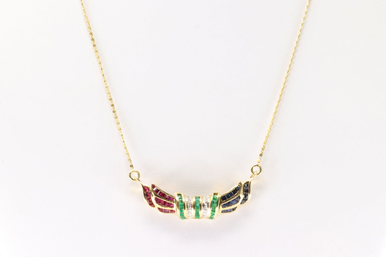 Multi-Color Gemstone & Diamond Necklace 18Kt.: Ladies 18Kt Yellow Gold Multi-Color Gemstone & Diamond Necklace. This Elegant Necklace has Charm with Rubies/ Emerald/ Sapphires & Sprakling Diamonds. 16.00" Total weight: 7.10 Grams.