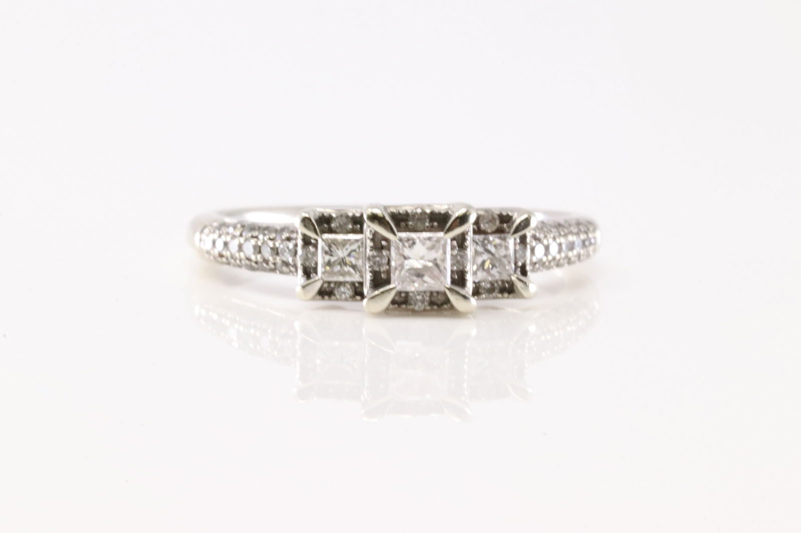 Diamond Ring 10Kt.: Ladies 10Kt White Gold Diamond Ring. This Charming Ring has 45 Round Sparkling Diamonds. Diamond Weight Approx: 0.30 ctw Ring Size: 7.00. Total Weight: 2.76. Grams.