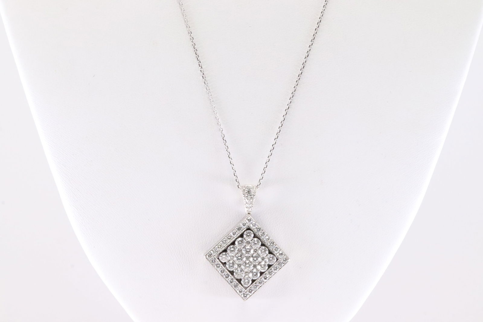 Diamond Pendant / Necklace 14Kt.: Ladies 14Kt White Gold Diamond Pendant / Necklace. This Charming Peandant has 63 Round Sparkling Diamonds With A 14Kt Necklace. Diamond Weight Approx: 3.50 ctw Necklace Length: 20.00. Total Weight: