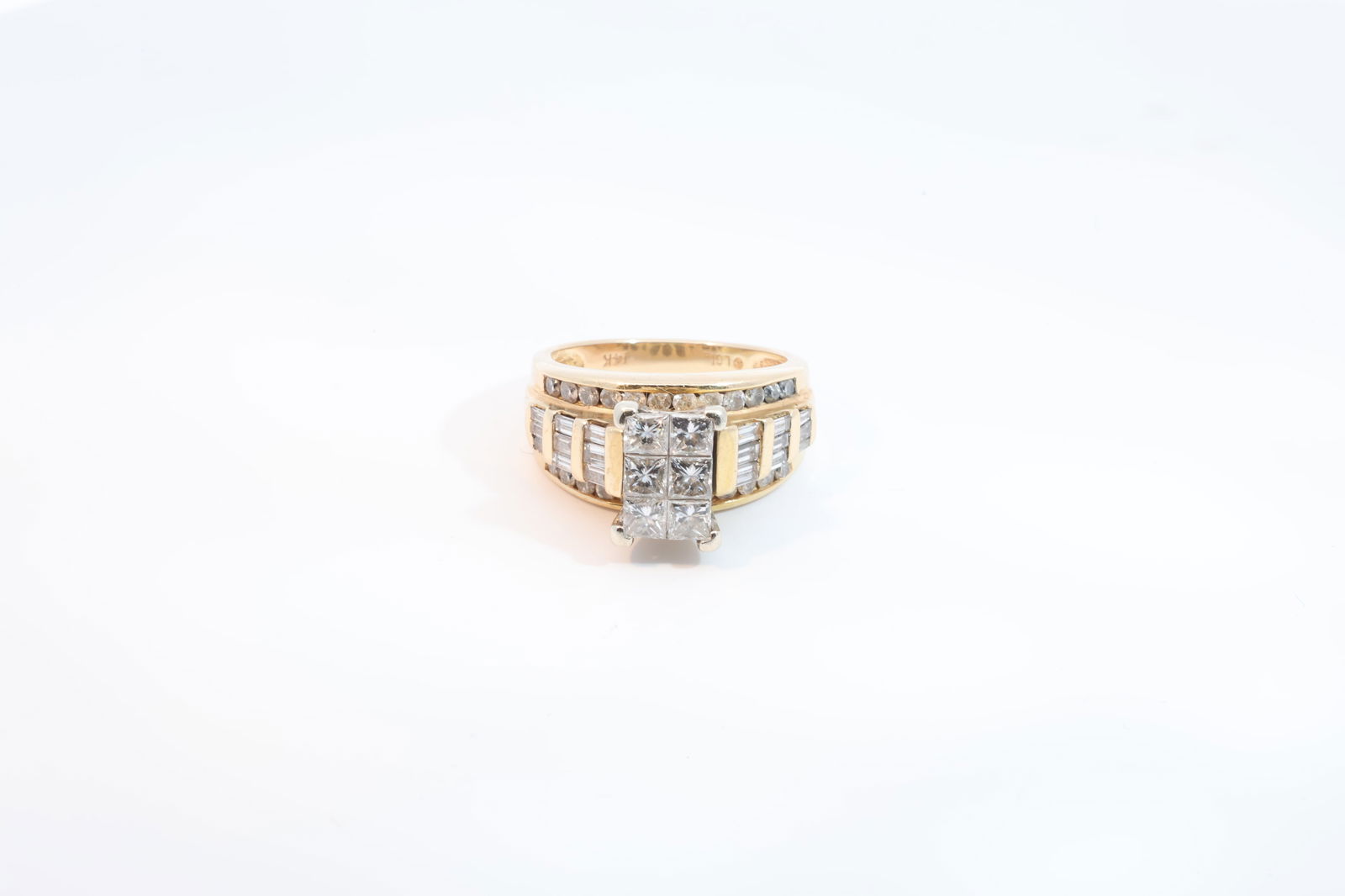 14Kt Yellow Gold Engagement Ring.: This Beautiful Engagement Ring Comes With Unique Details The Main center Stones arePrincess Cut Diamonds & Radiant Baguette Cut Diamonds On Each Sides & Sparkling Round Cut Diamond On Top & Bottom