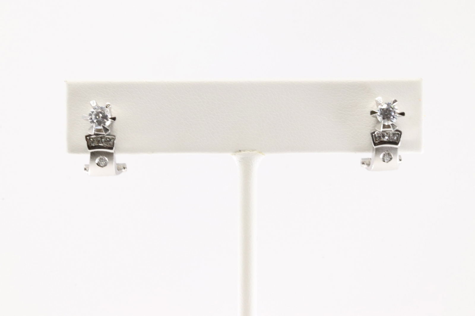 Diamond French Clip Earring 14Kt.: Ladies 14Kt White Gold Diamond French Clip Earring. This Earring has 8 Round Sparkling Diamonds. Diamond Weight Approx: 0.866ctw. Total Weight: 3.00 Grams