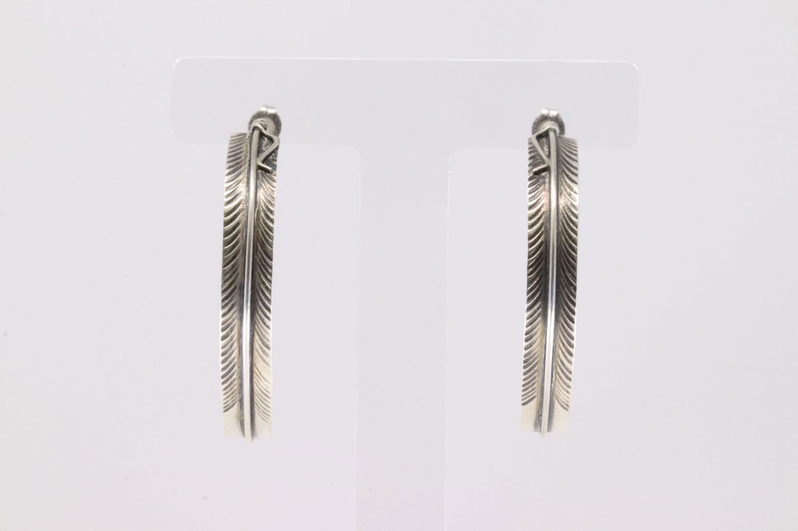 Native America Navajo Sterling Silver Feather Hoop Earring's By Chris Charley.: This is a Native America Navajo Sterling Silver Feather Hoop Earring's By Chris Charley.