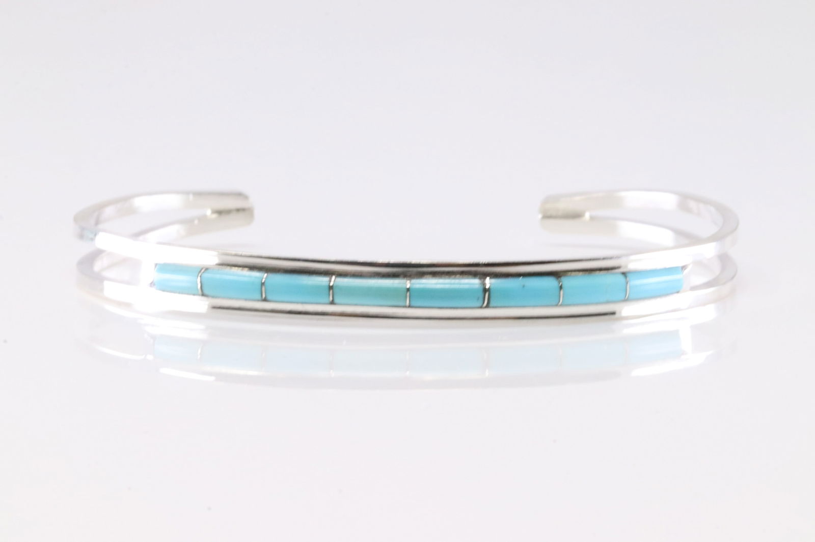 Native America Zuni Sterling Silver Turquoise Bracelet By Anson Wallace.: This is a Native America Zuni Sterling Silver Turquoise Bracelet By Anson Wallace.
