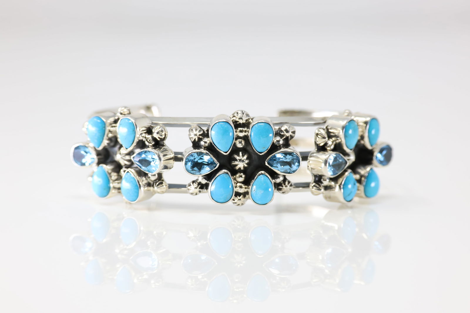 Native America Navajo Sterling Silver Blue Topaz & Turquoise Bracelet Cuff By Mike Smith. From R.B: This is a Native America Navajo Sterling Silver Blue Topaz & Turquoise Bracelet Cuff By Mike Smith. From R.B Company. Stamp By R.B Company.
