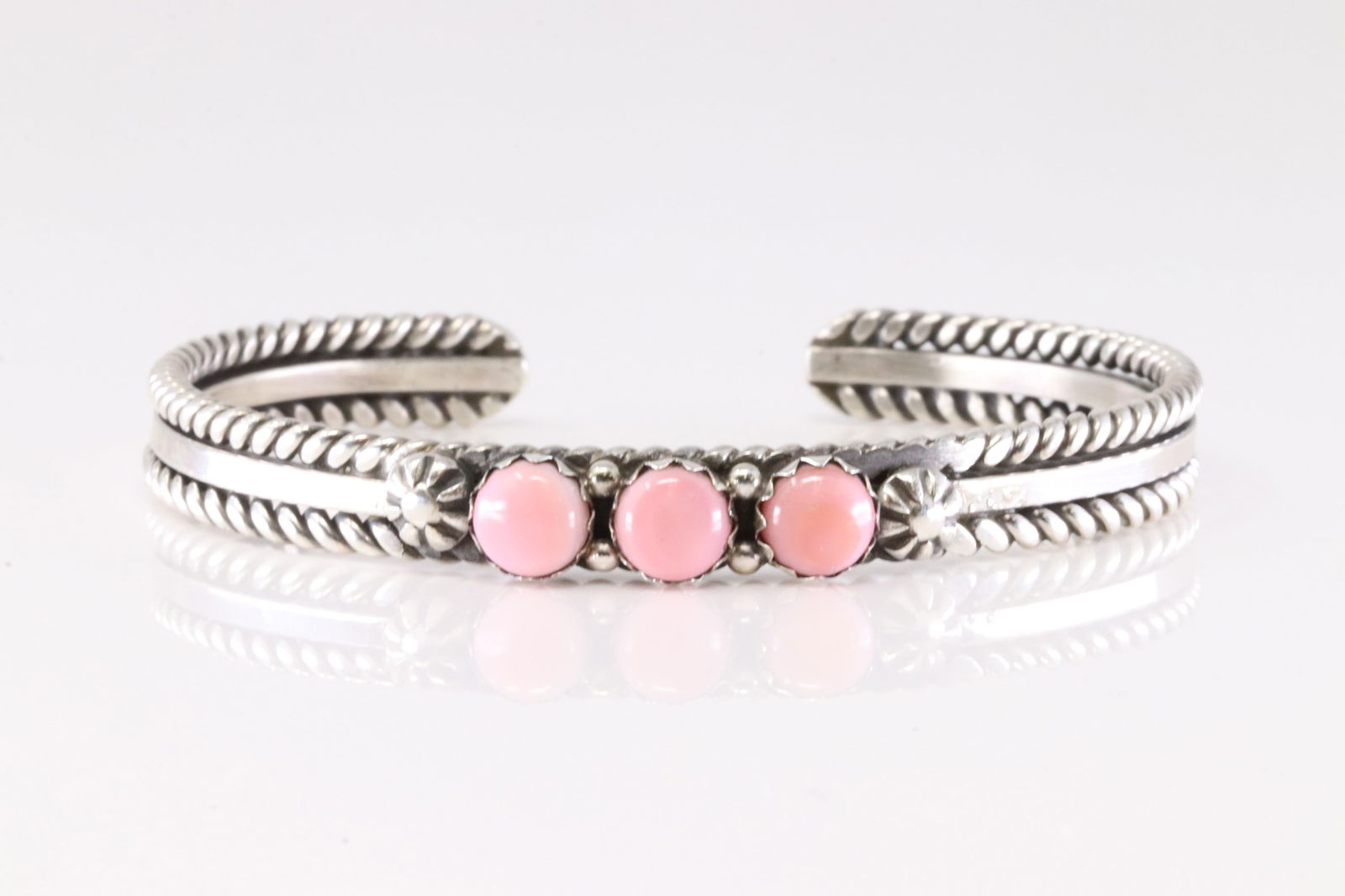 Native America Navajo Sterling Silver Pink Conch Bracelet Cuff By R King.: This is a Native America Navajo Sterling Silver Pink Conch Bracelet Cuff By R King. Stamp R King.