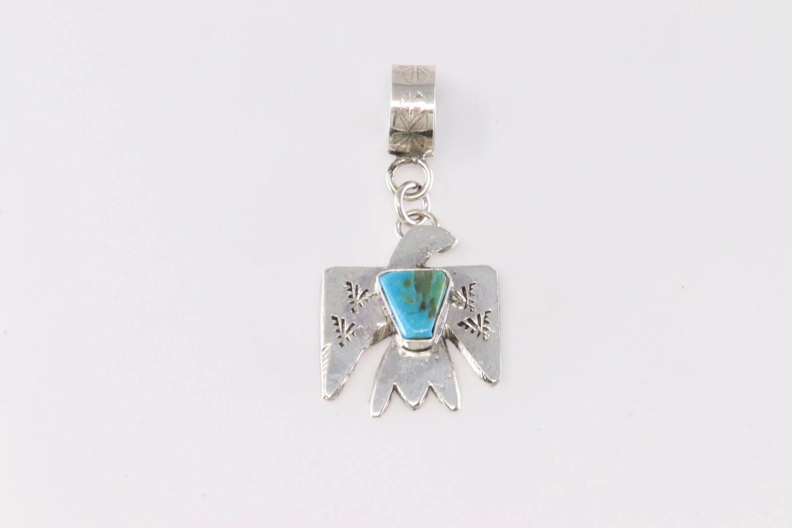 Native America Zuni Sterling Silver Turquoise Thunderbird Pendant By Jude Candelaria.: This is a Native America Zuni Sterling Silver Turquoise Thunderbird Pendant By Jude Candelaria. Stamp Jude Candelaria.