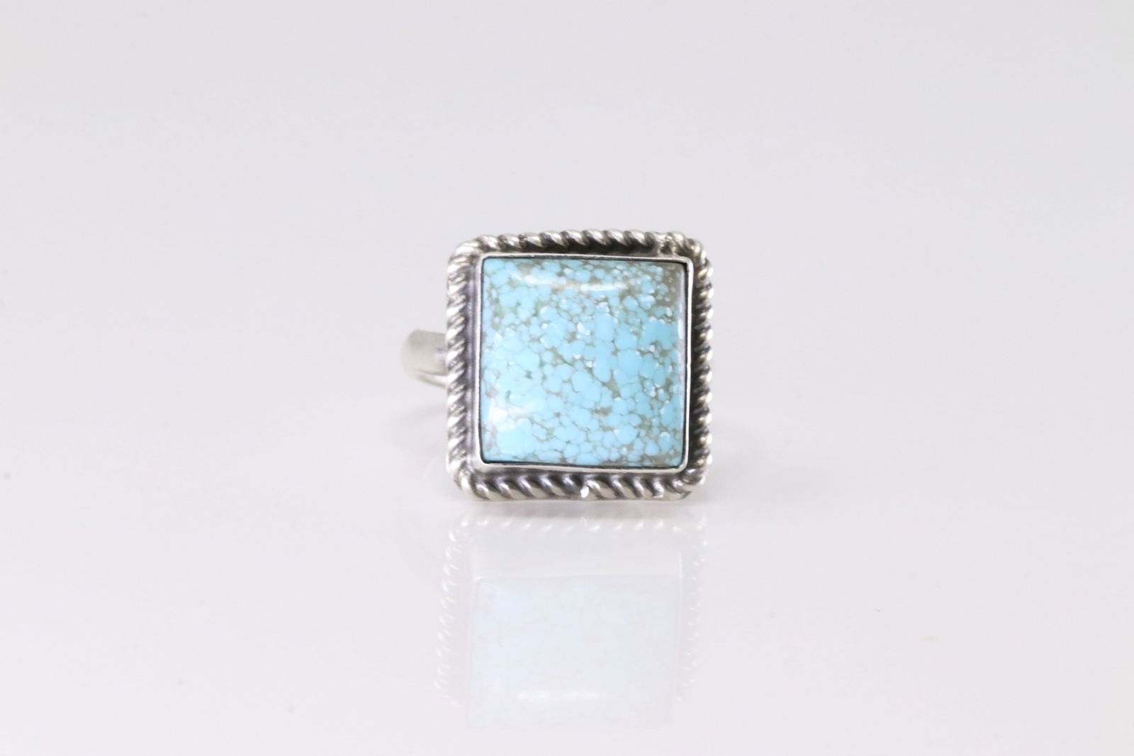 Native America Navajo Sterling Silver Turquoise Ring By J.: This is a Native America Navajo Sterling Silver Turquoise Ring By J. Stamp J. Ring Size: 6.00.