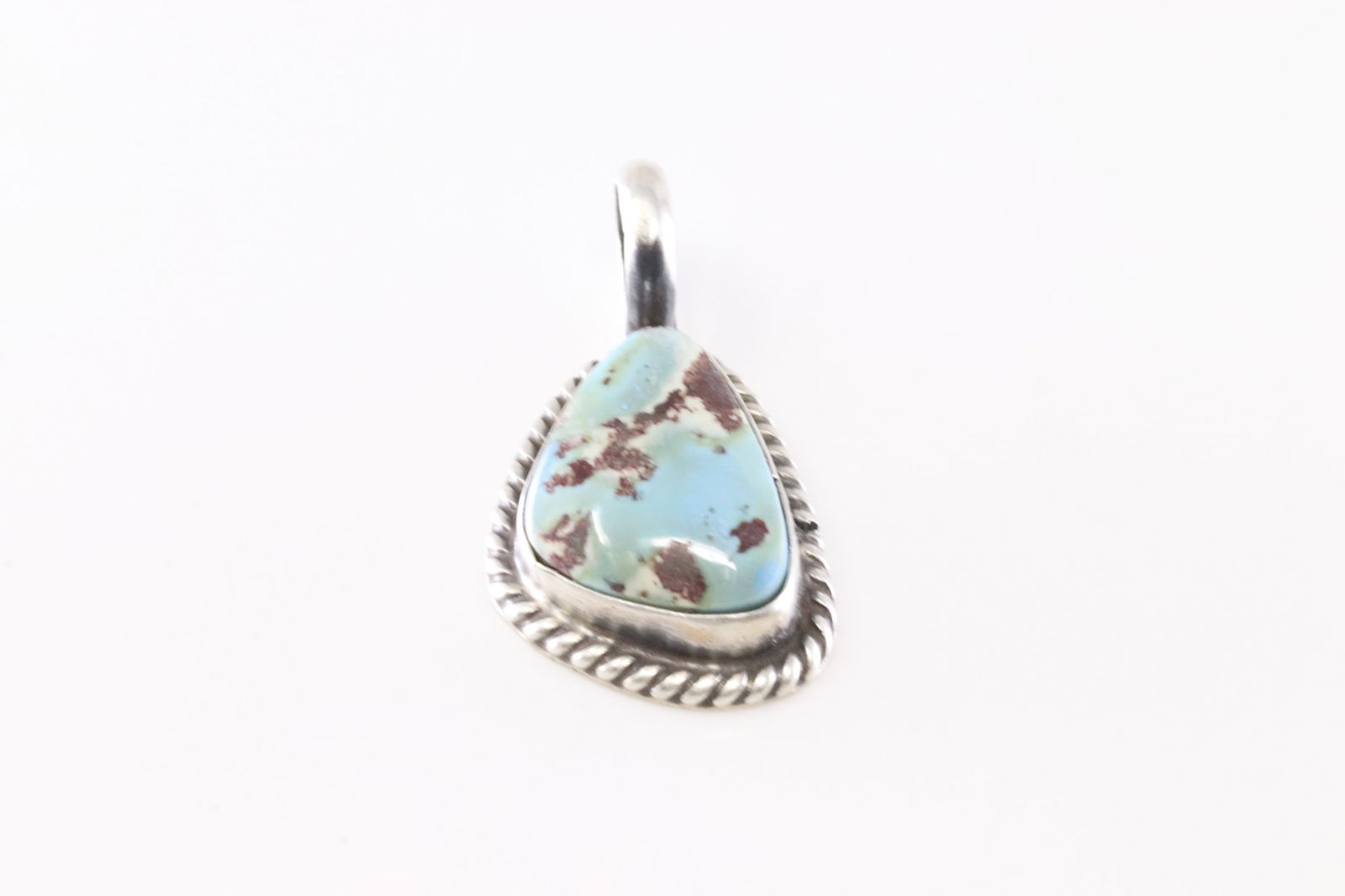 Native America Navajo Sterling Silver Turquoise Pendant By Dixon.: This is a Native America Navajo Sterling Silver Turquoise Pendant By Dixon. Stamp Dixon.