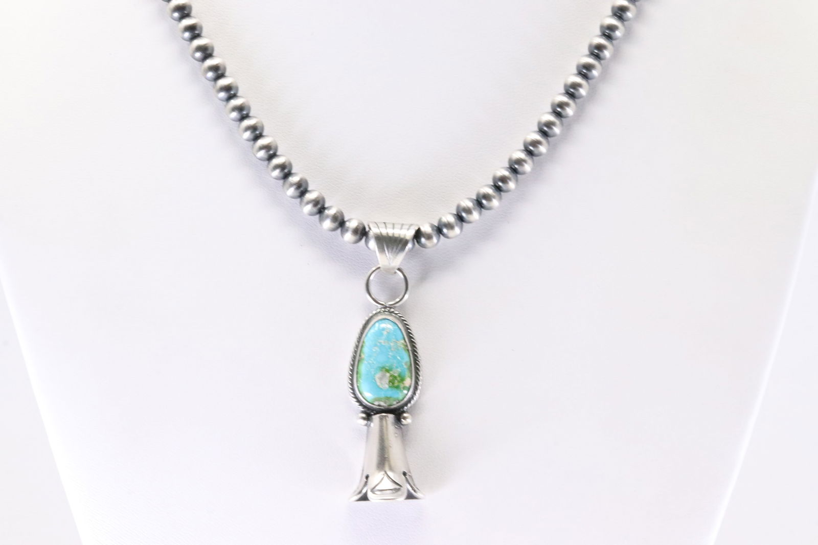 America Sterling Silver Sonora Gold Turquoise Pendant With Machine Made Sterling Silver Pearl Beaded: This is a America Sterling Silver Sonora Gold Turquoise Pendant With Machine Made Sterling Silver Pearl Beaded Necklace. Necklace Length: 16.00.