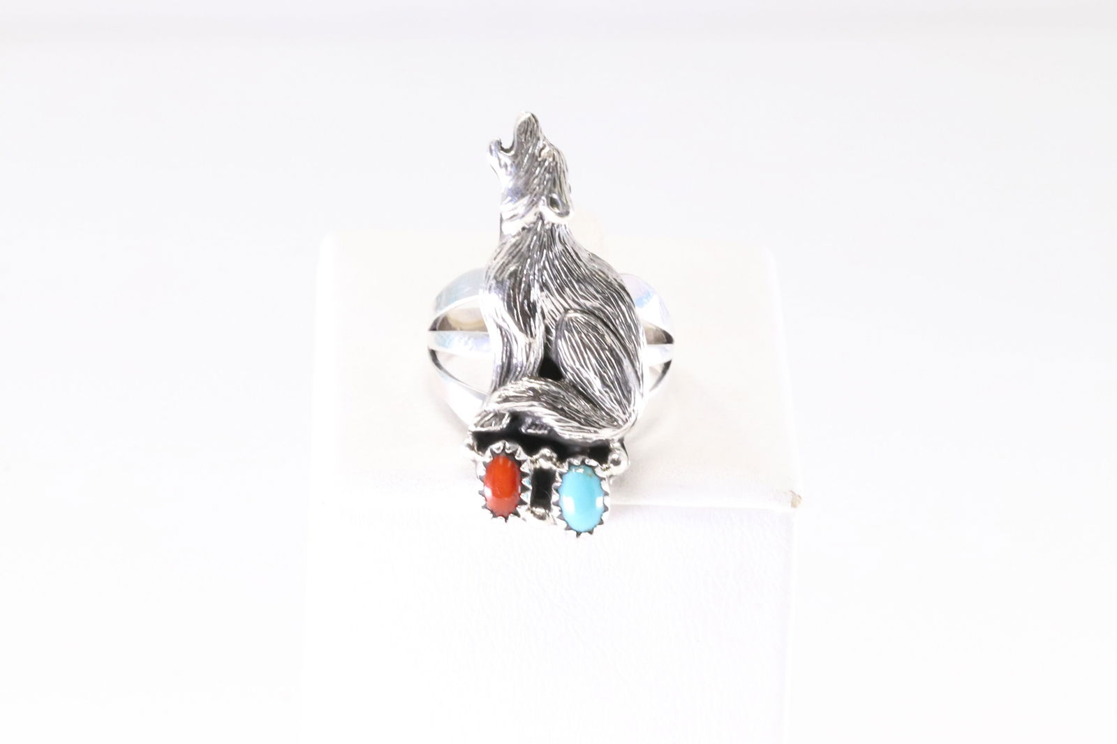 America Sterling Silver Coral & Turquoise Wolf Ring.: This is a America Sterling Silver Coral & Turquoise Wolf Ring. Ring Size: 8.00.