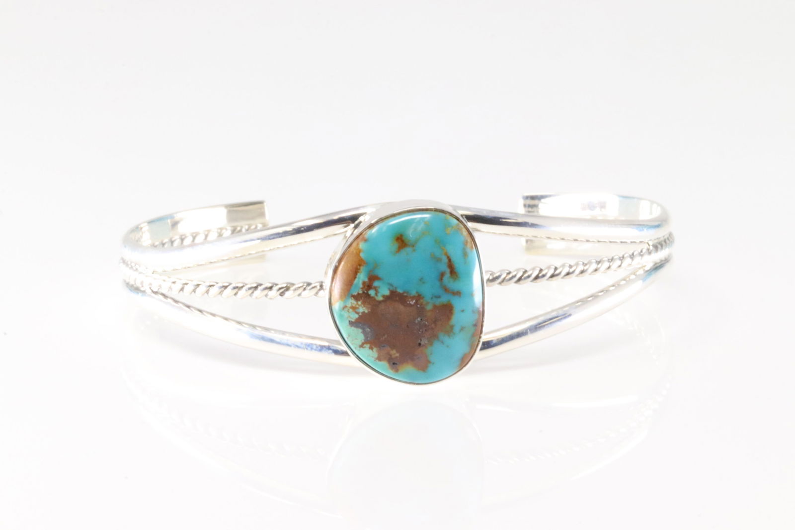 Native America Navajo Sterling Silver Turquoise Bracelet Cuff By A.C.: This is a Native America Navajo Sterling Silver Turquoise Bracelet Cuff By A.C. Stamp AC.