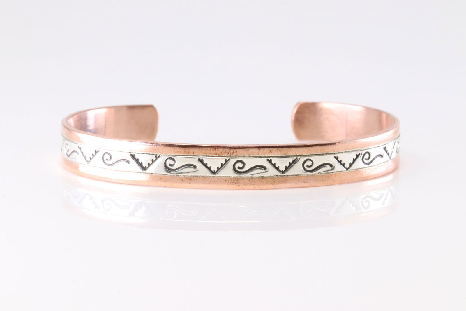 Native America Copper Sterling Silver Stamped Bracelet Cuff By Wylie Secatero.: This is a Native America Copper Sterling Silver Stamped Bracelet Cuff By Wylie Secatero. Stamp Wylie Secatero.