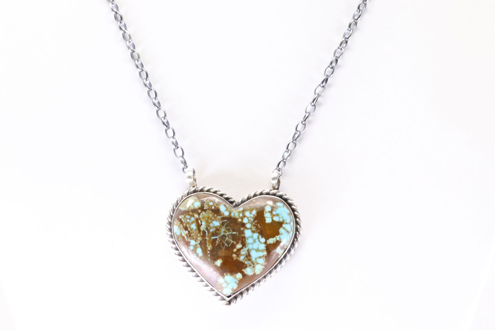 Native America Navajo Sterling Silver Turquoise Heart Necklace By Chassity Belone.: This is a Native America Navajo Sterling Silver Turquoise Heart Necklace By Chassity Belone. Stap C.Belone. Necklace Length: 16.00.