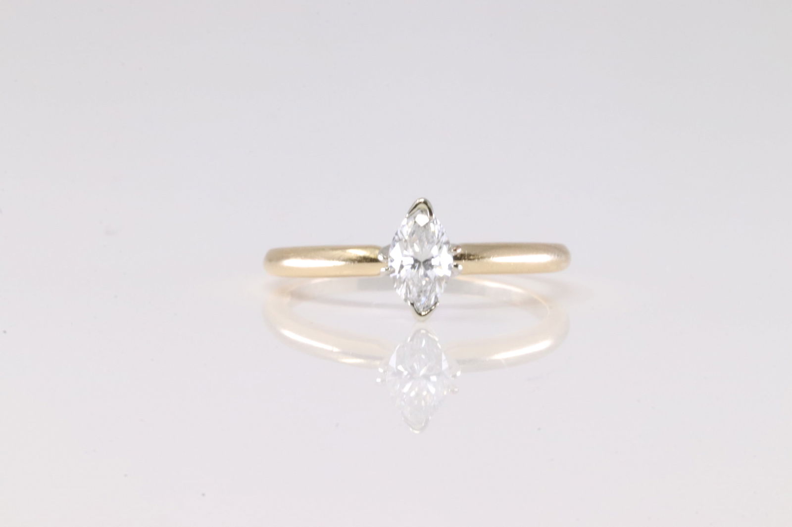 Diamond Ring 14Kt.: Ladies 14Kt Yellow Gold Diamond Ring. This Chraming Ring has Solitaire Marquise Diamond. Diamond weight approx:0.90 ctw Total weight 2.62 Grams. Ring size: 8.00.